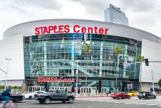 Front view of the Staples Center in Los Angeles, capturing urban architecture and street activity.